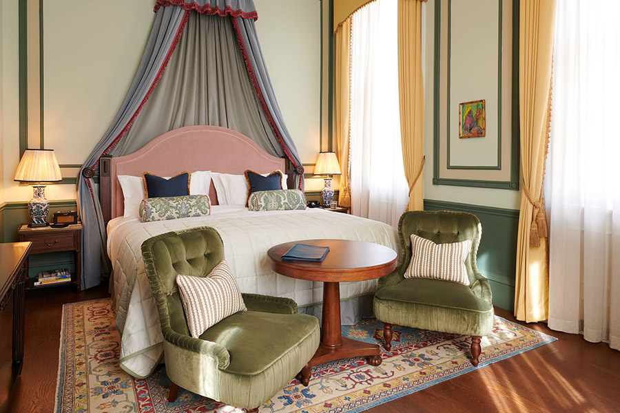 A wide view of a large bed in a House Bedroom at Gleneagles Townhouse