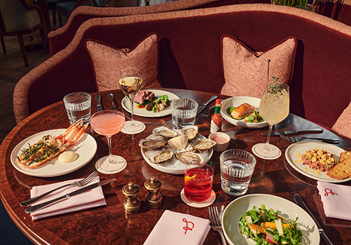 A table set up with food in The Spence