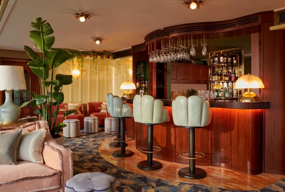 Bar area in rooftop terrace with high bar stools