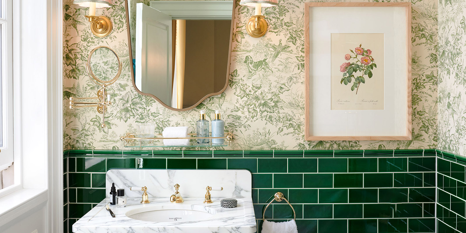 Green tiled bathroom with gold detailing