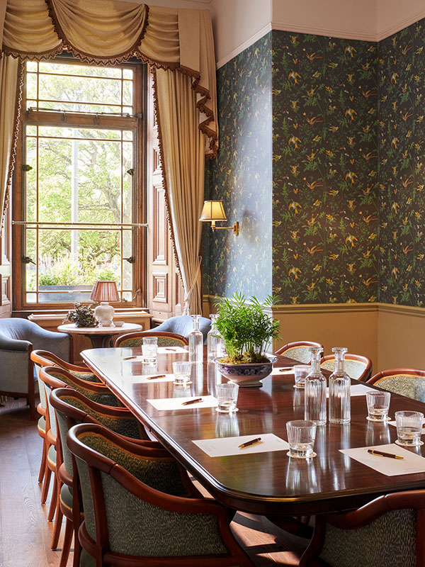 Meeting room set up with pen, paper within Gleneagles Townhouse