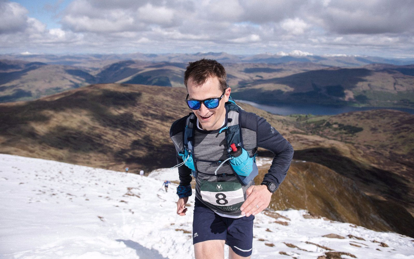 A man running up snowy Ben Vorlich in Perthshire as part of the Gleneagles Great Adventure Race