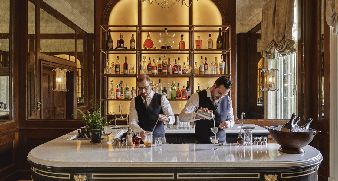 The Bar in Ochil House at Gleneagles with two barmen making drinks