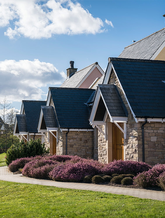 Stone houses on a bright sunny day at Glenmor