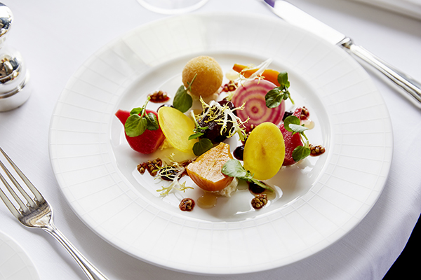 A beautifully delicate heritage beetroot salad on a white plate in the Strathearn