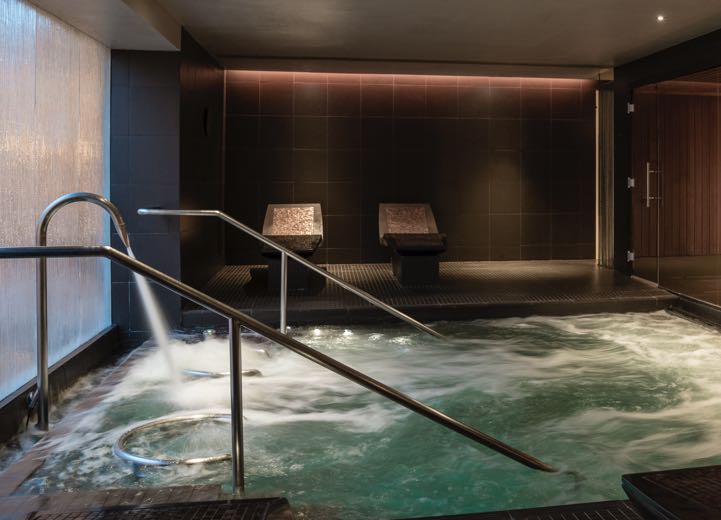 A spa pool with bubbling water and water jets