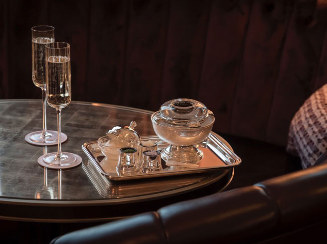 Champagne in flutes on a table in the American Bar