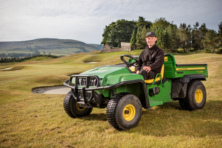 A Greenkeeper on a John Deere vehicle at Gleneagles