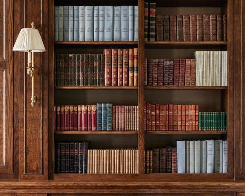 A library of books and a lamp in the broadcasting room