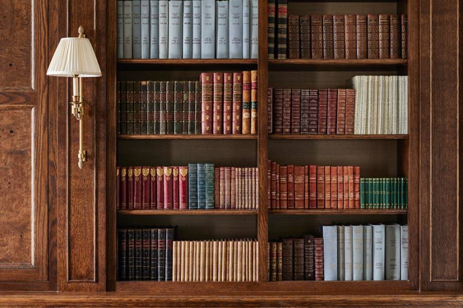 A library of books and a lamp in the broadcasting room