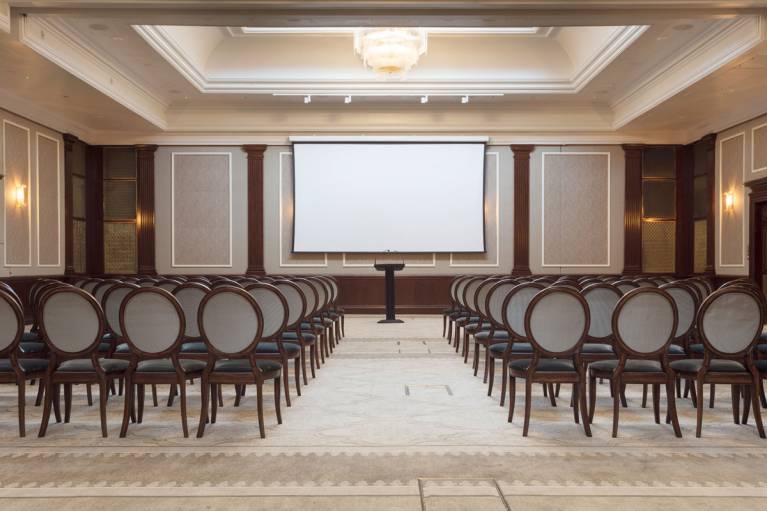 The Henry hall set with projection screen and theatre-style chairs