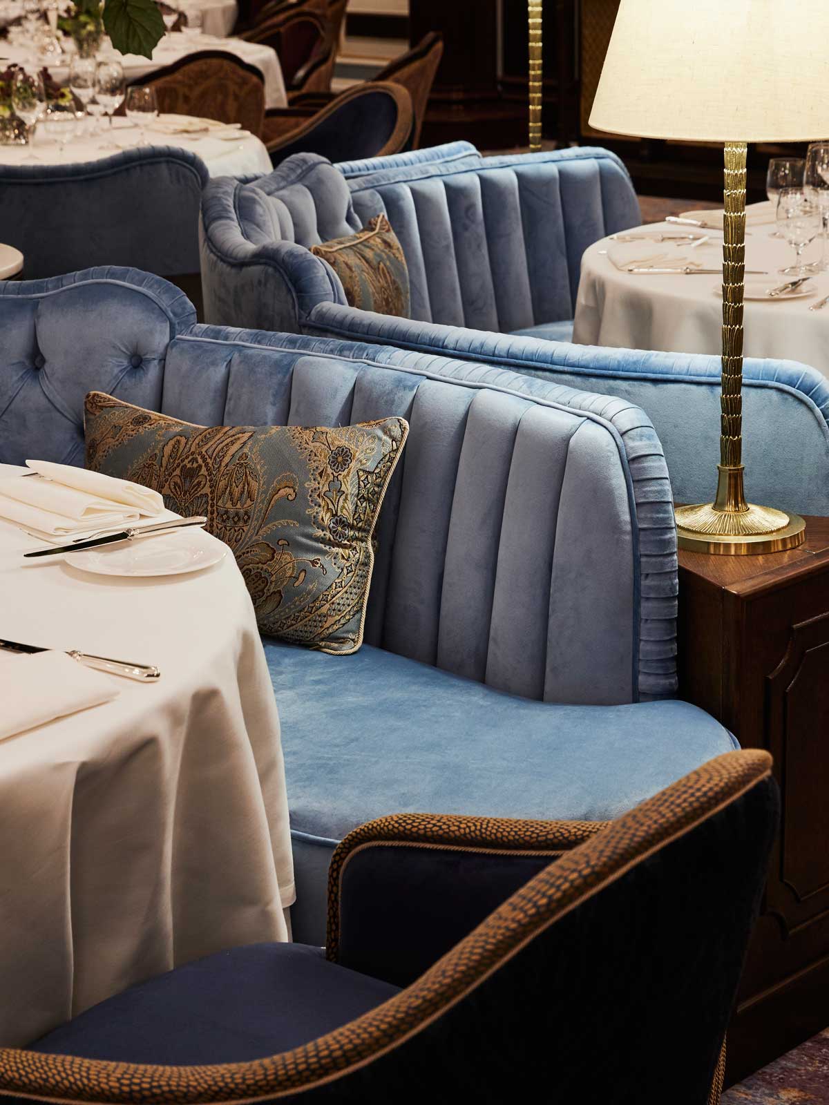 An abstract shot of blue bay seats and lamps in the Strathearn restaurant at the 5 star hotel resort, Gleneagles