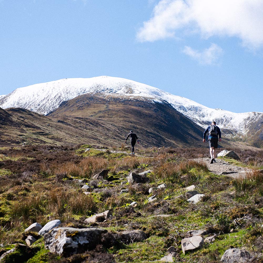 Two hikers on a snow-capped Ben Vorlich near Gleneagles