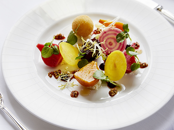 A delicate salad on a white plate in the Strathearn restaurnat at Gleneagles