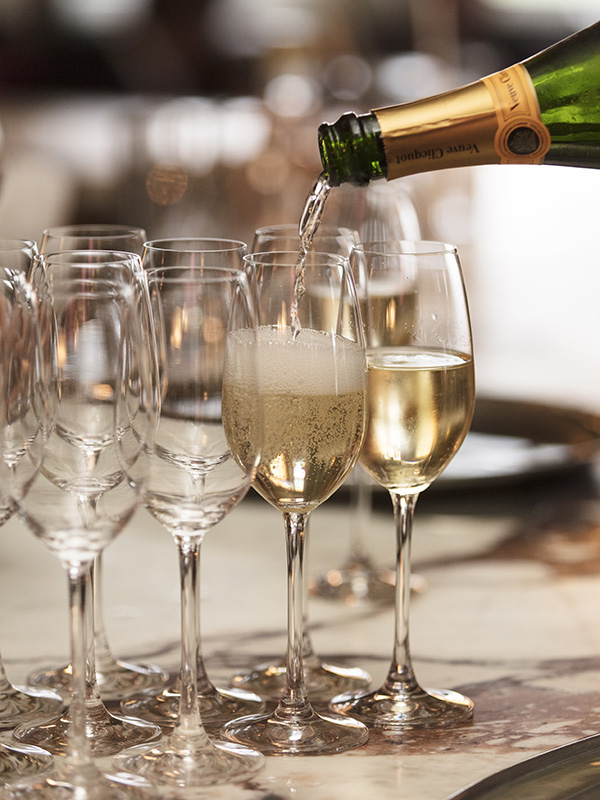 Champagne glasses being filled