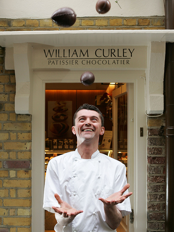 William Curley, choclatier in his Richmond shop with lovely easter eggs.
