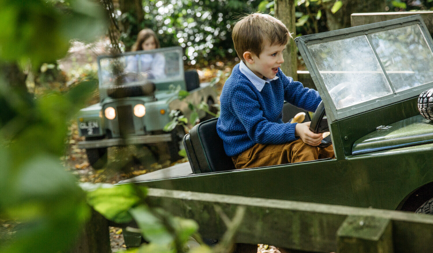 Boy doing family off road experience