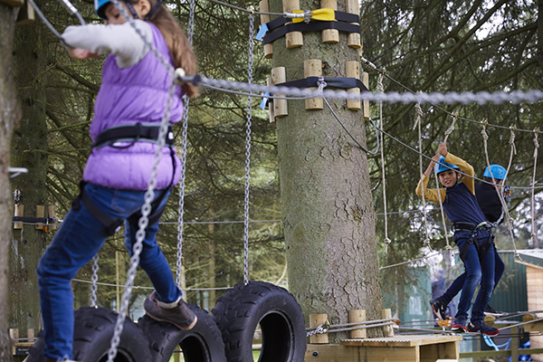 Children make their way around the low ropes course at Gleneagles