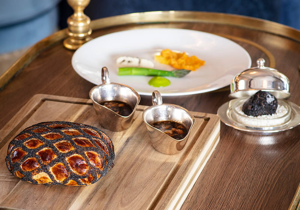 A beef wellington and accompaniments on a trolley in the Strathearn