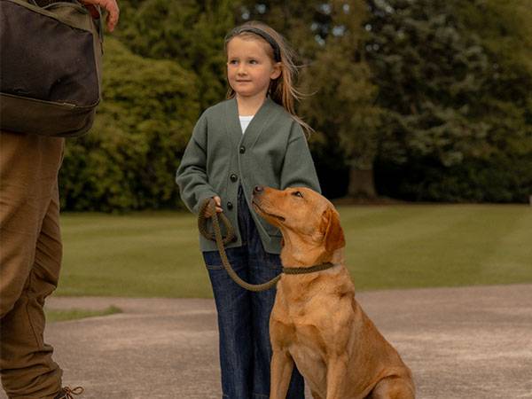 Young girl on gundog lesson with older male coach
